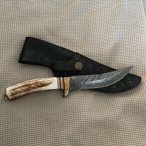 Hand carved and made in laguna beach knife in leather case